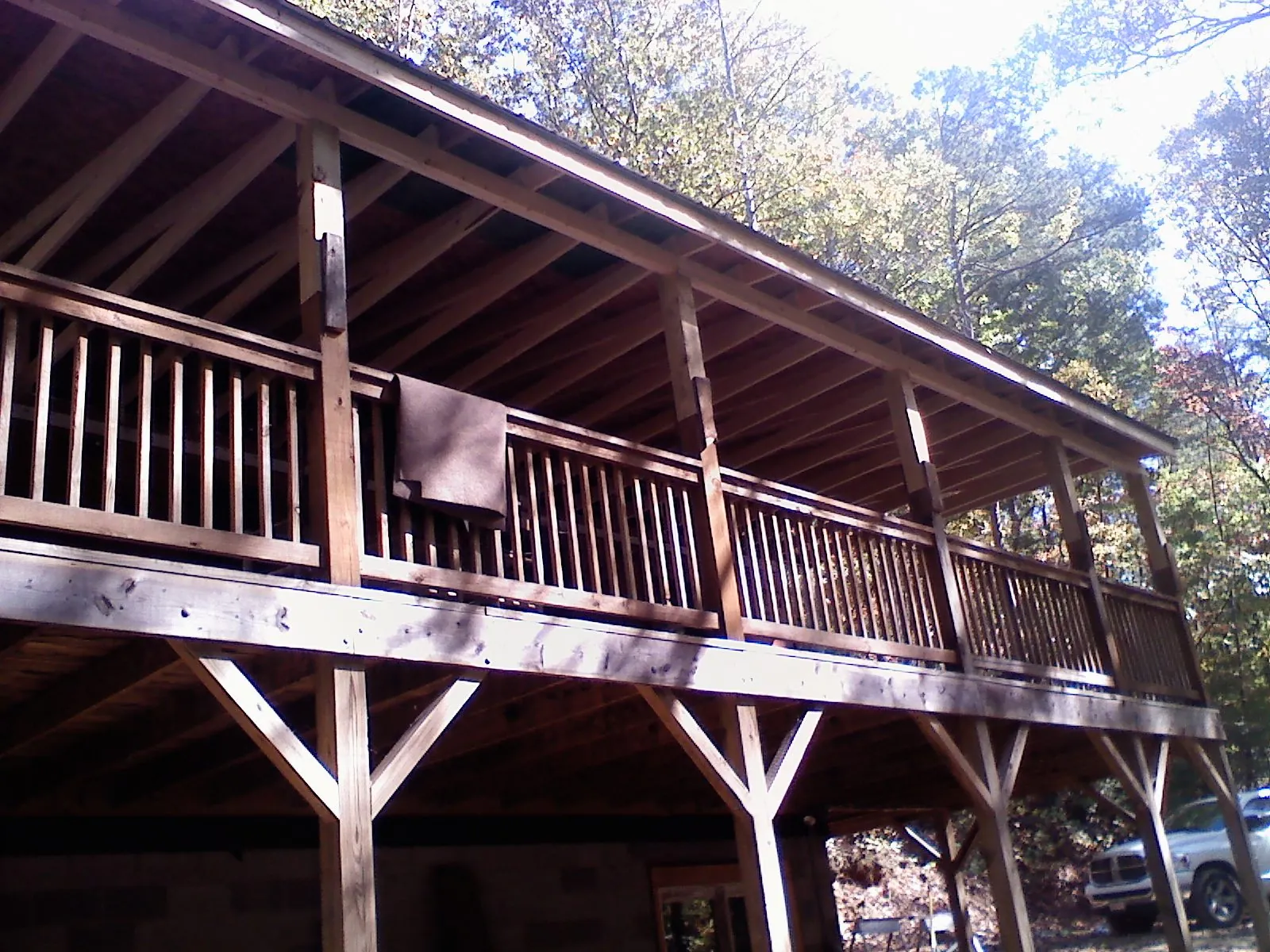 Timber framing under a new elevated porch and deck — Roof Leak Repair in Paynesville by Roofing Brothers